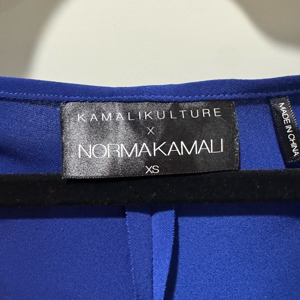 Norma Kamali great condition
Elegant Blue Ruched Dress - Picture 3 of 3